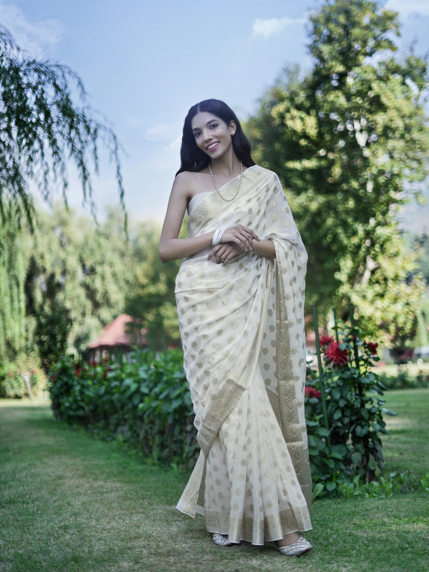 JYOTSANA - MILKY WHITE AND GOLD VISCOSE SAREE WITH OVERALL BUTTA