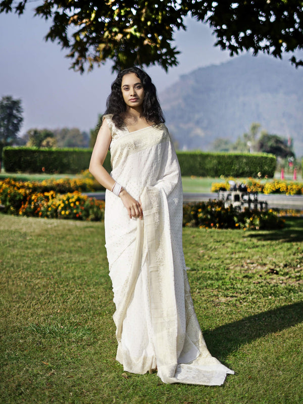 white and gold polka dot saree