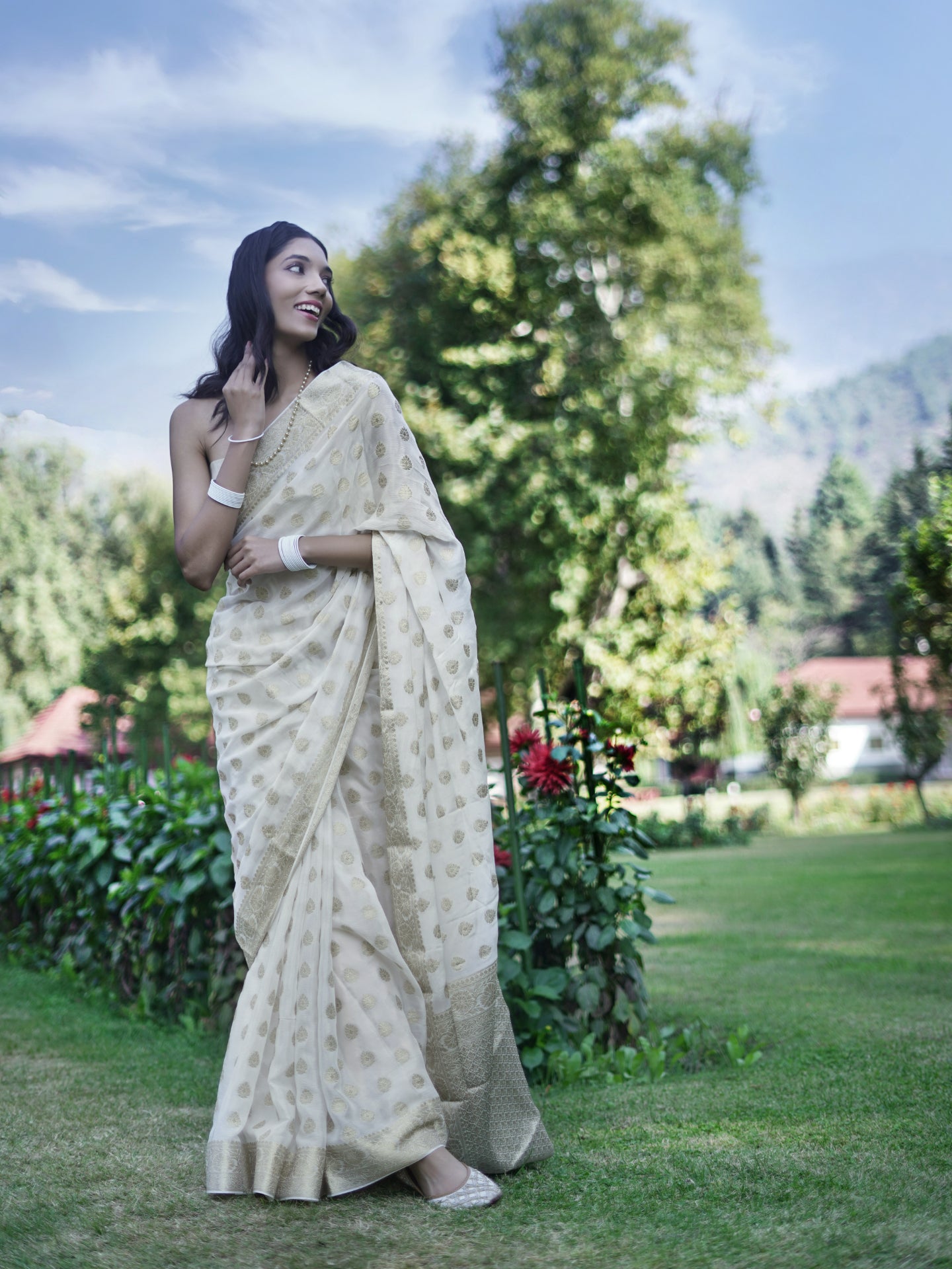JYOTSANA - MILKY WHITE AND GOLD VISCOSE SAREE WITH OVERALL BUTTA