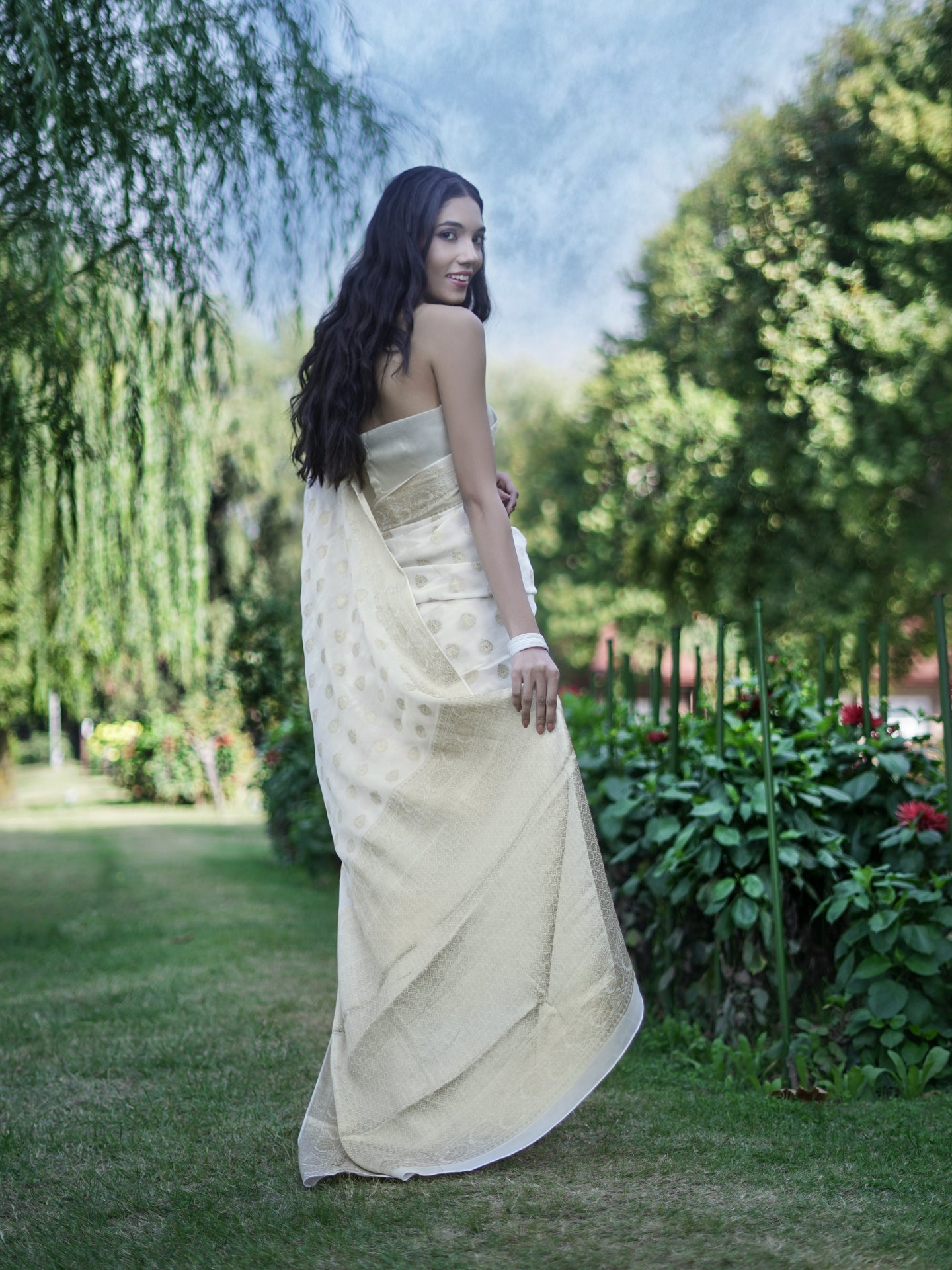 JYOTSANA - MILKY WHITE AND GOLD VISCOSE SAREE WITH OVERALL BUTTA