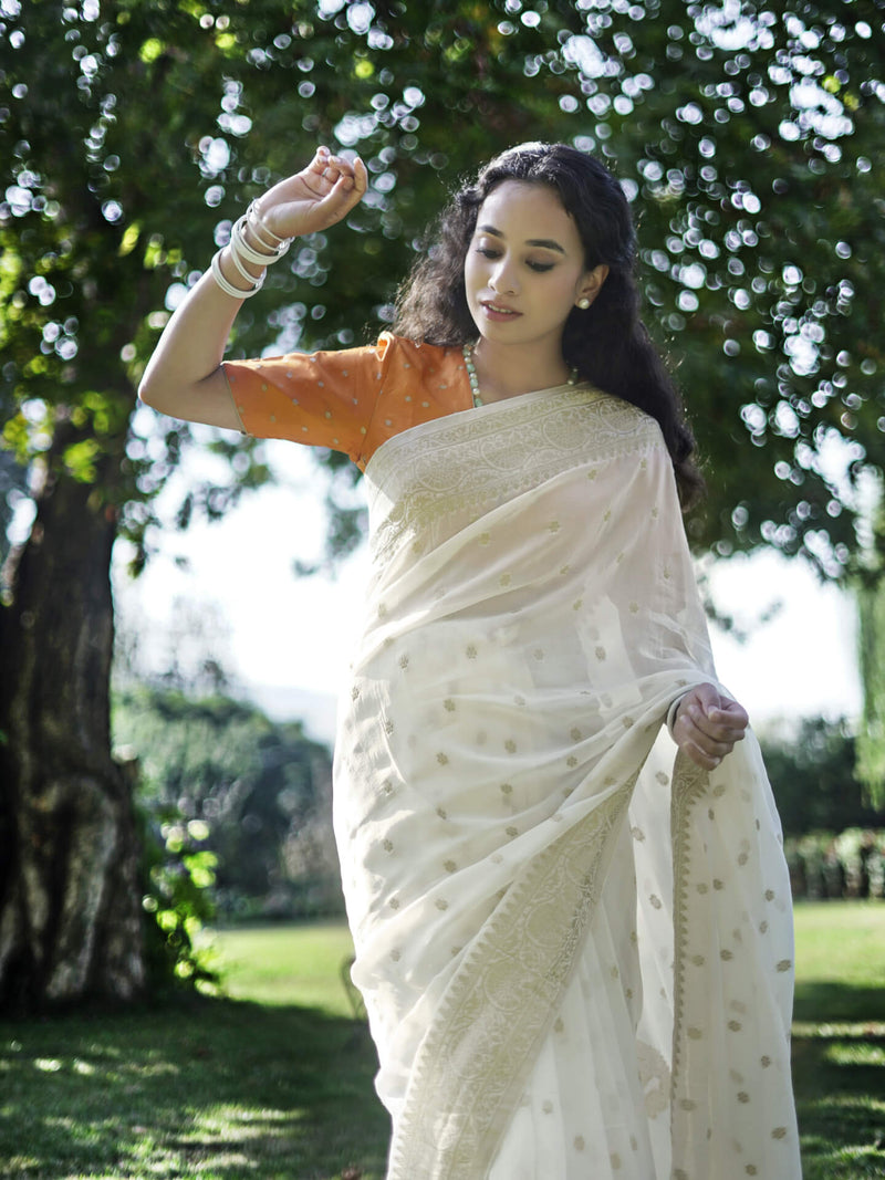 LEELA - MILKY WHITE AND GOLD VISCOSE SAREE WITH MINIMAL BUTTI