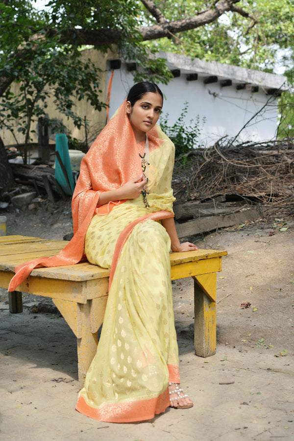 yellow georgette brocade saree