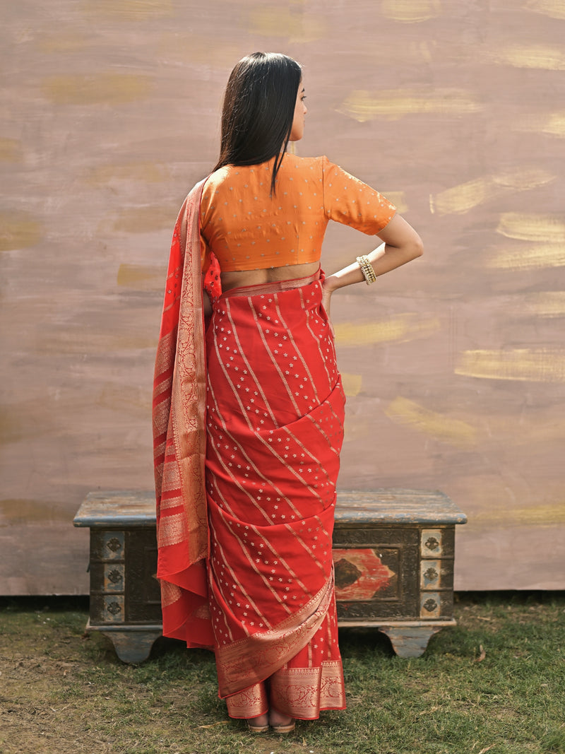 ZAINA - RED CREPE SAREE WITH STRIPES AND FLOWER BUTTI