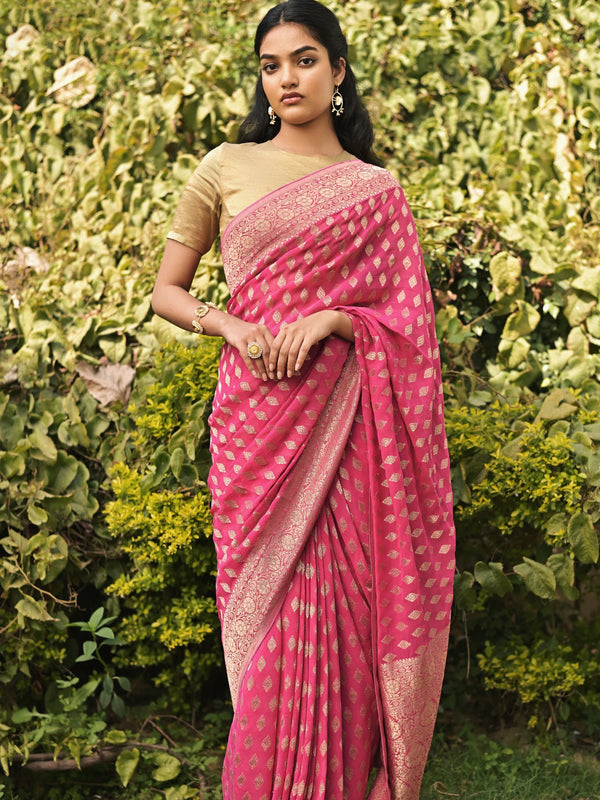hot pink viscose saree with flower butties