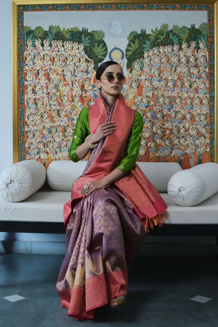 printed silk saree paired with a three-quarter blouse