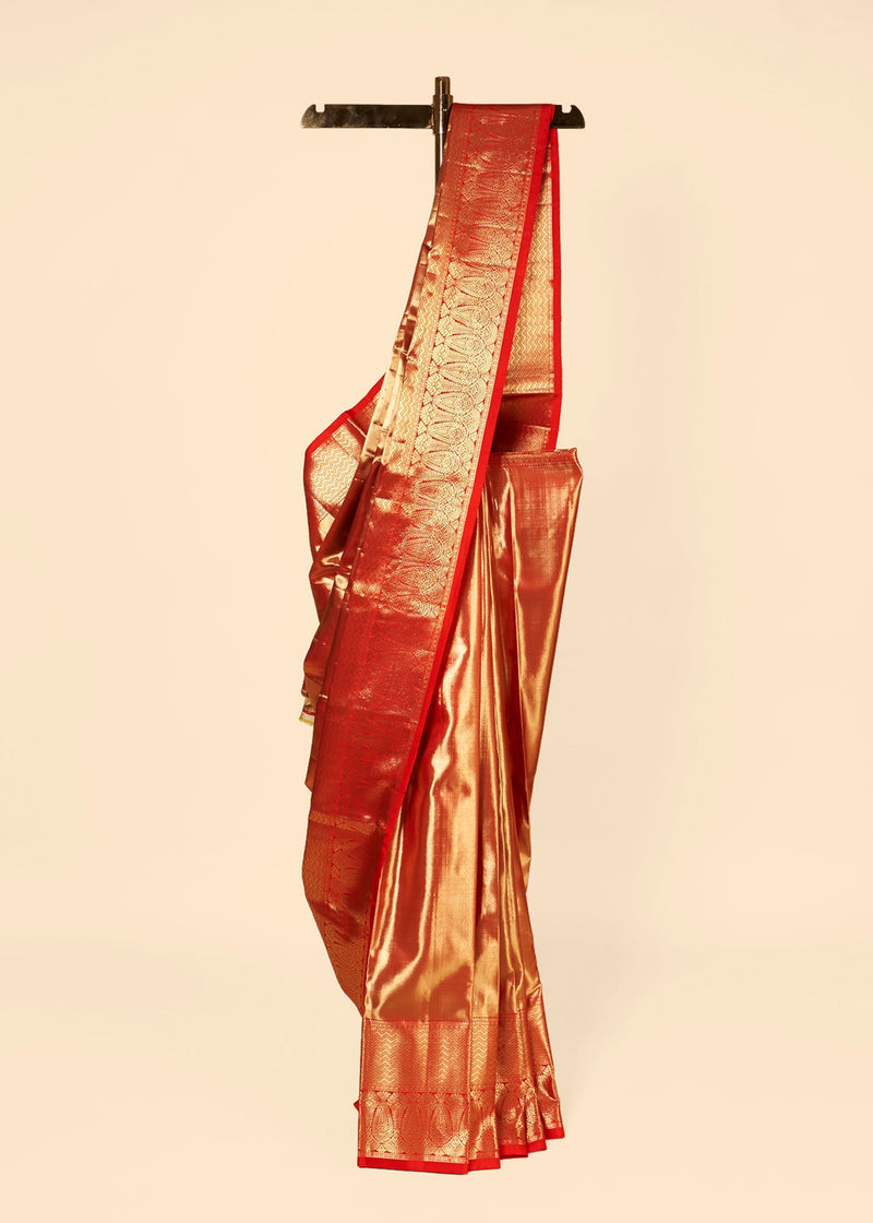 red silk saree with a golden border